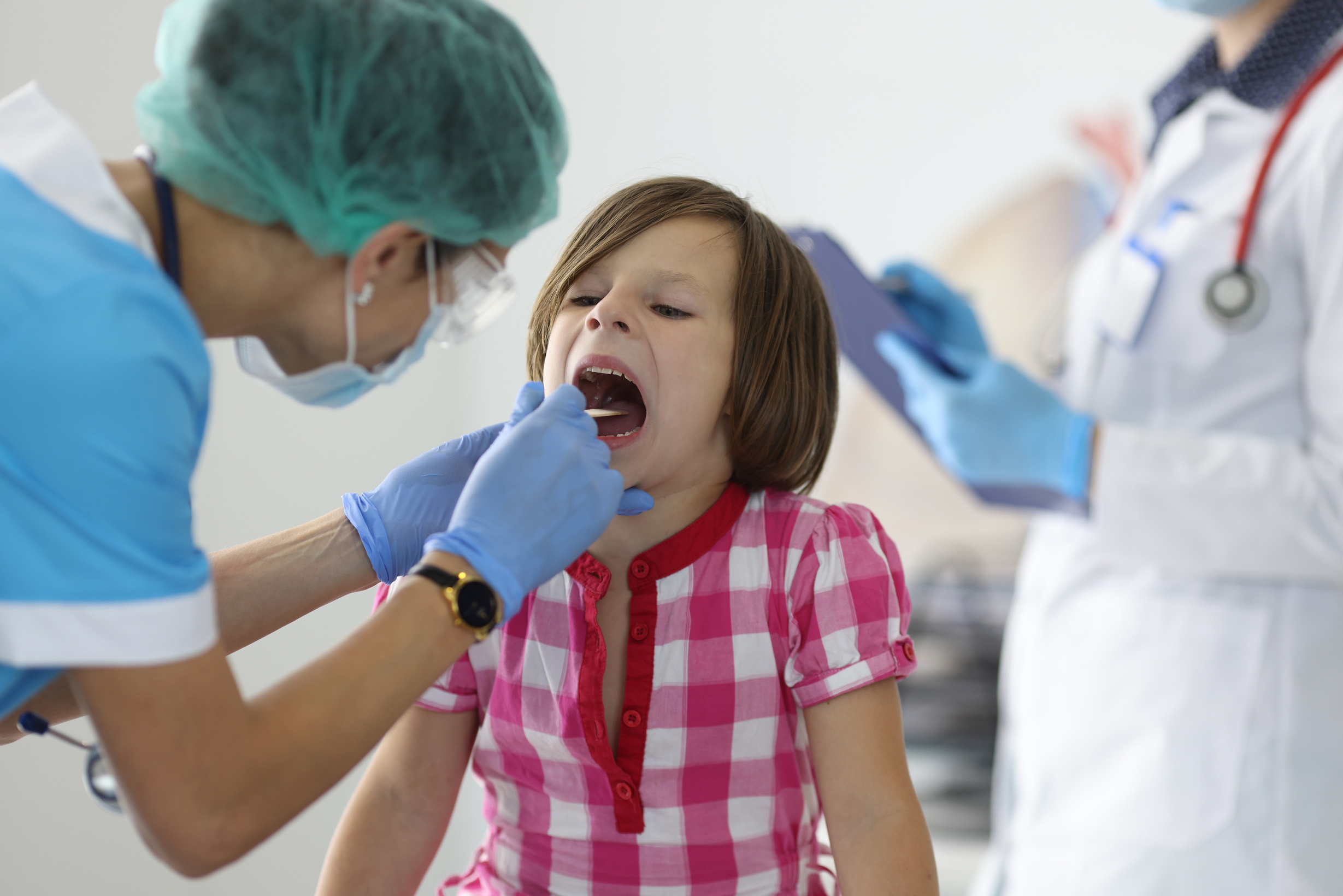Female Nurse Takes Cotton Bud to Analyze Saliva, Nasal Swab, Mucous Membrane for DNA Tests
